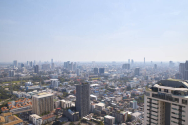Blur background of morning gold light view over cityscape Bangkok