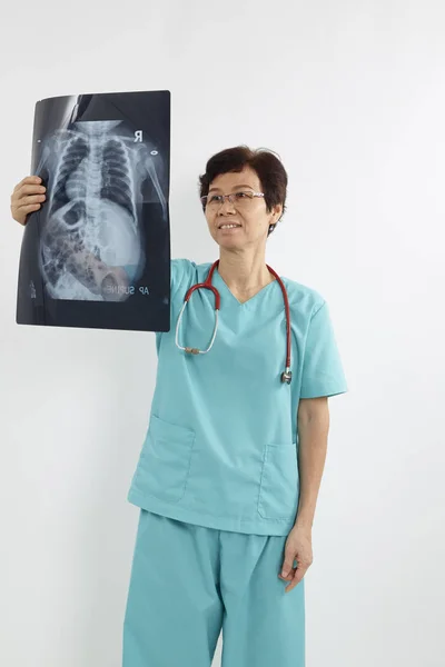 Old Female Doctor Looking Ray White Background — Stock Photo, Image