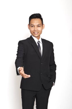 Elini, sunan yakışıklı Asya genç iş adamı el sıkışma