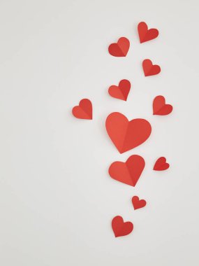 Beyaz tuval doku arka plan üzerinde izole kırmızı kağıt kalpler