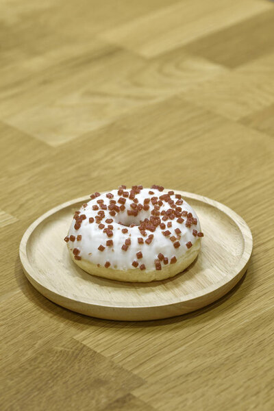 Food design Strawberry donut on wooden table