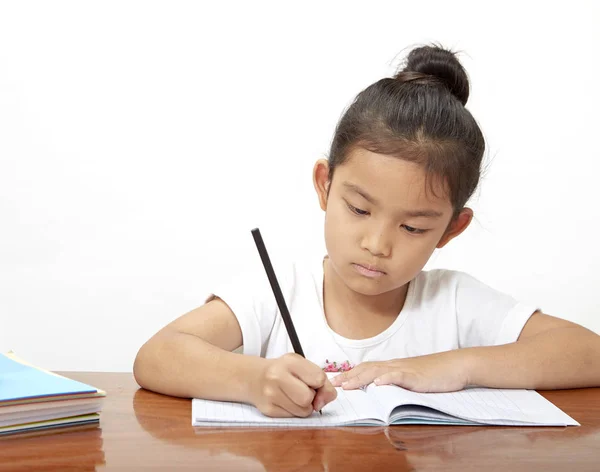 Asian Little Girl Concentrated While Doing Her Homework Empty Area — Stock Photo, Image