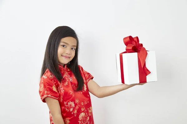 Chinese Girl eight year old girl with Chinese New Year 2019 With gift box on white backgrond, Concept New Year Sale