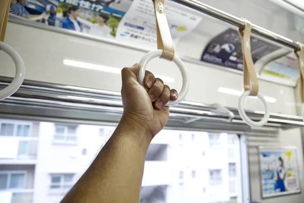 Train strap . Scenery inside the train in japan