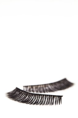 Beyaz arka plan üzerinde kirpik ile kompozisyon