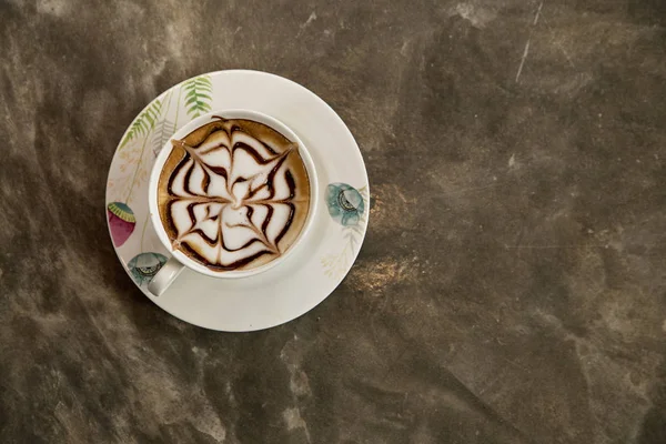 cappuccino with latte art on table. Morning coffee for couple in love. Top view.