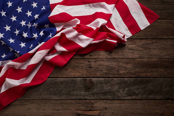 American flag on old rustic wooden board. Concept Important Day America Empty space for design