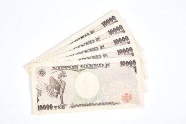 Japon yen banknot ve beyaz arka plan üzerinde Japonca yen sikke