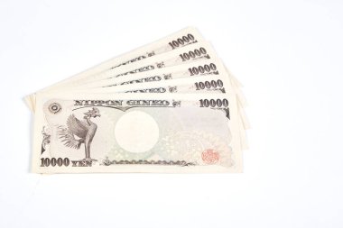 Japon yen banknot ve beyaz arka plan üzerinde Japonca yen sikke