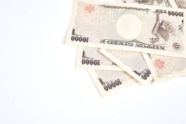 Japon yen banknot ve beyaz arka plan üzerinde Japonca yen sikke