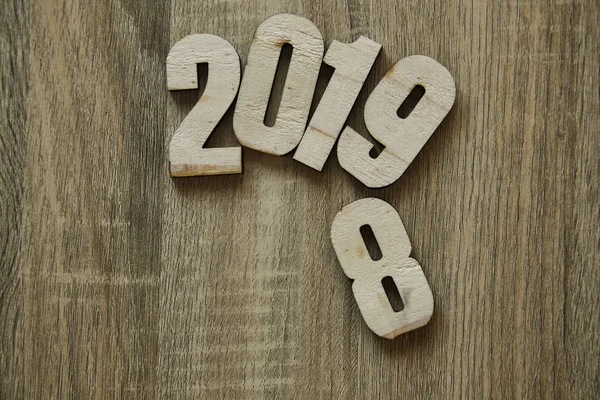 Work goal concept New Year 2019 Background workspace frame on wooden background .flat lay