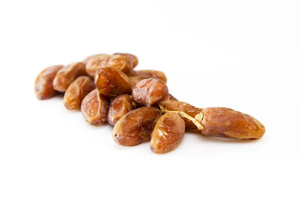 Date Creative Dried Sfondo Bianco Gambo Piatto Concetto Alimentare — Foto Stock