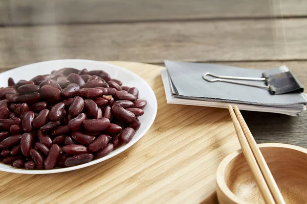 Canned Red Kidney Beans In White Bowl On Wooden background - Photography Food Image