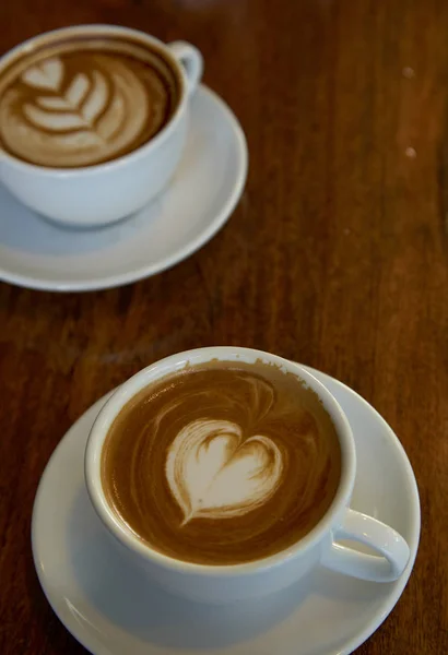 two cups of coffee on wood  Romantic dinner in valentine\'s day