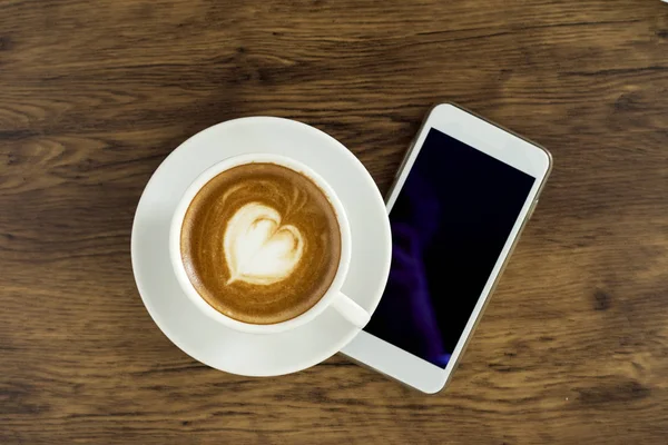 Csésze Kávé Egy Fehér Kupa Szúró Telefon Háttér Felülnézet Online — Stock Fotó