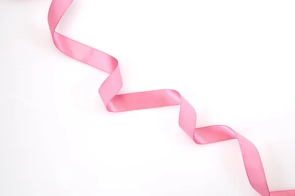 Curled Pink Ribbon White Background Empty Space Design — Stock Photo, Image