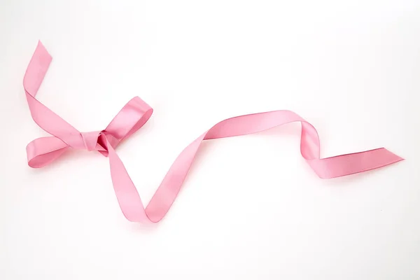 Curled Pink Ribbon White Background Empty Space Design — Stock Photo, Image