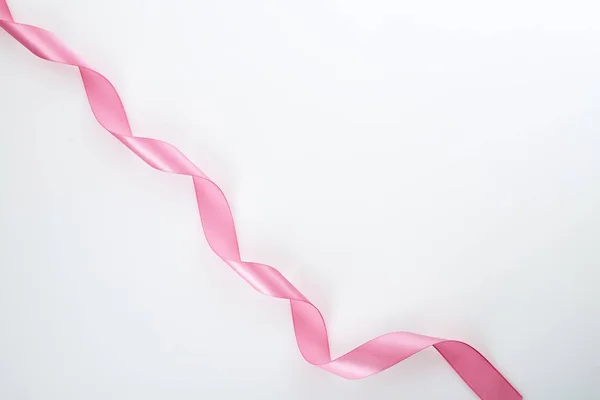 Curled Pink Ribbon White Background Empty Space Design — Stock Photo, Image