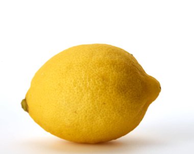 Tropikal meyve Beyaz arka plan üzerinde Bir Bütün olgun limon, Düz yatıyordu