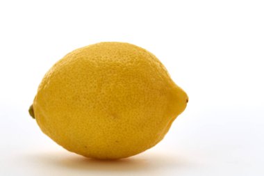 Tropikal meyve Beyaz arka plan üzerinde Bir Bütün olgun limon, Düz yatıyordu