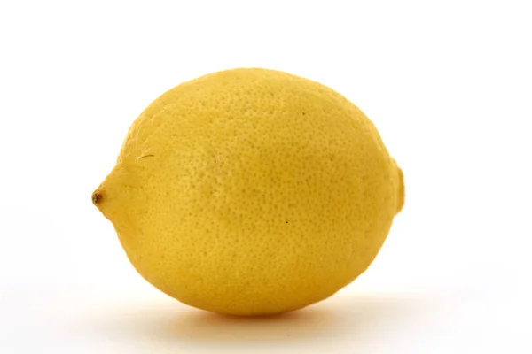 Tropikal Meyve Beyaz Arka Plan Üzerinde Bir Bütün Olgun Limon — Stok fotoğraf
