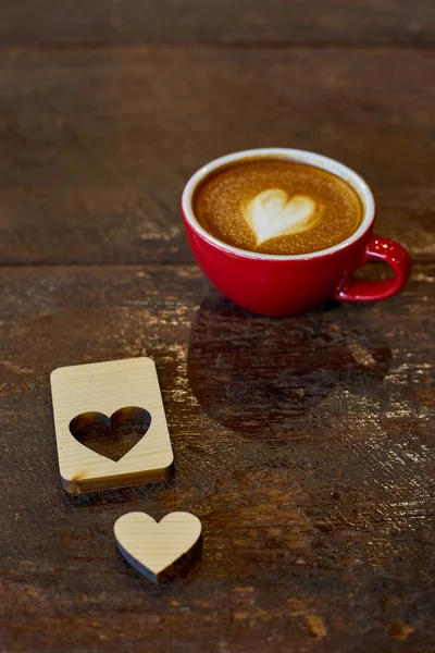 Hearts Coffee time on wood background, Valentine's day desk minimal style concept with copy space.