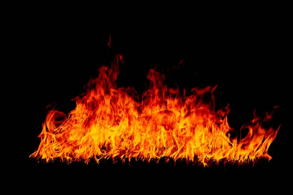 Siyah Arka Plan (Real Fire) üzerinde Bulanık Parlak Kırmızı ve Turuncu Firestorm Doku, uçan yangın kıvılcım atış
