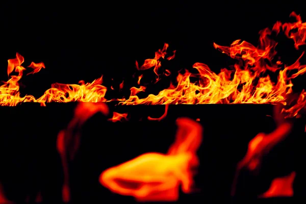 Borrosa Textura Brillante Tormenta Fuego Rojo Naranja Sobre Fondo Negro —  Fotos de Stock