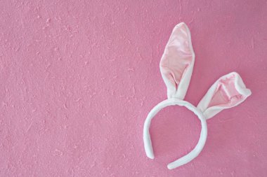 Happy bunny ears easter day Pink mulberry paper background, Copy space, with place for text. Spring concept. clipart
