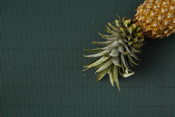 Pineapple on paper green background — Stock Photo, Image