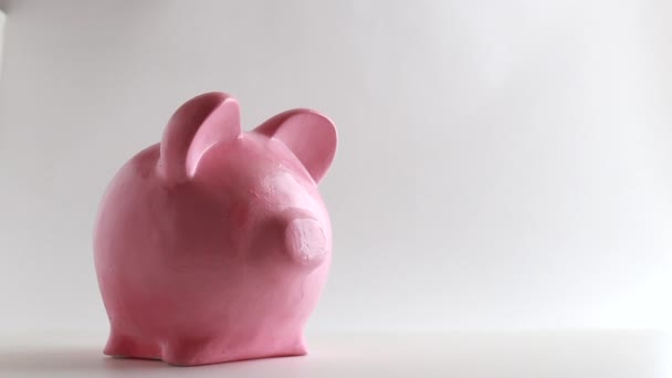 Hand Puts Dollar Piggy Bank Concept Saving Future Retirement — Stock Video