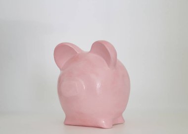 beyaz zemin üzerinde pembe kumbara