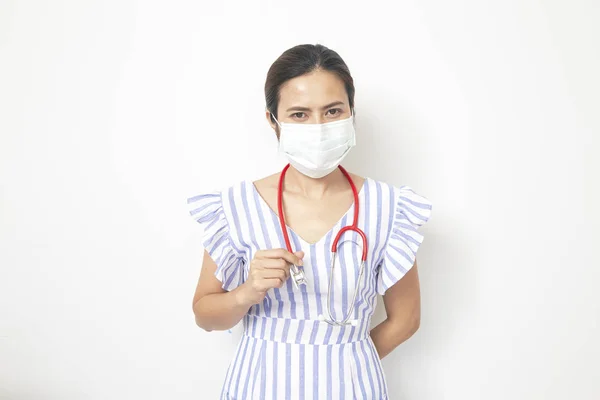 Kobieta lekarz noszenie maski — Zdjęcie stockowe