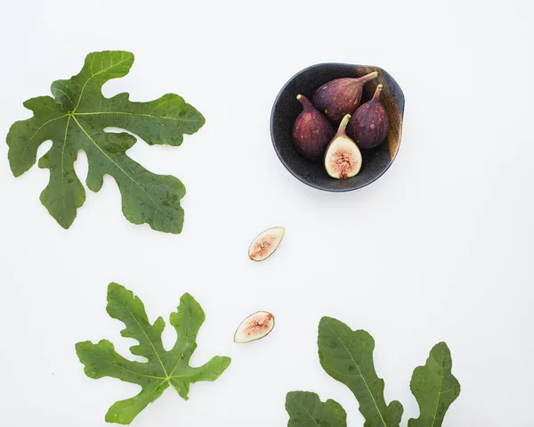 Sliced fresh figs on white background — Stock Photo, Image