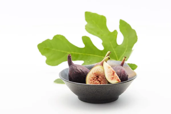 Sliced fresh figs on white background — Stock Photo, Image