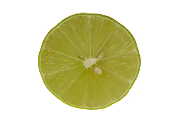 Tranche de citron vert frais sur blanc — Photo