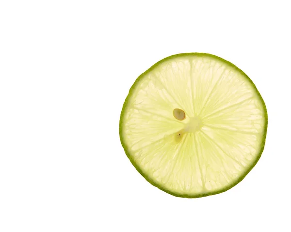 Tranche de citron vert frais sur blanc — Photo