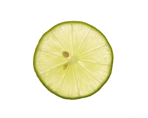 Slice fresh lime on white — Stock Photo, Image