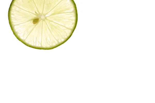 Slice fresh lime on white — Stok Foto