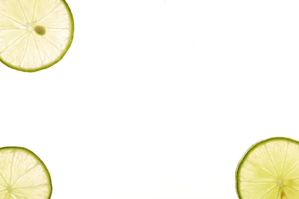 Slice fresh lime on white — Stok Foto