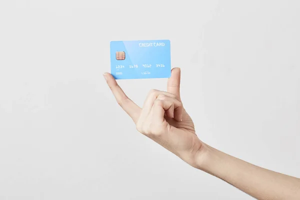 Credit Card in de hand op wit — Stockfoto