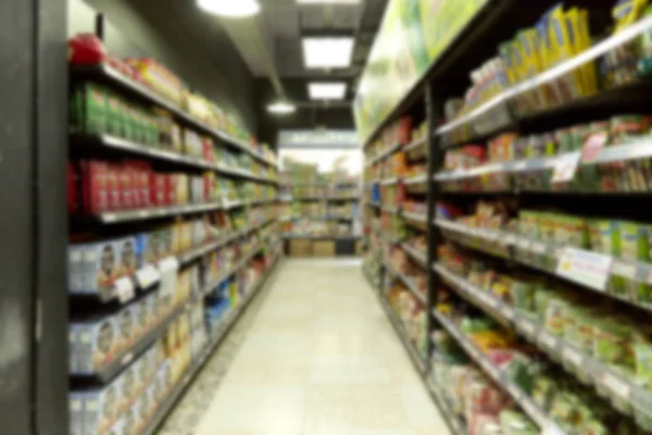 Empty supermarket blurry for background — Stock Photo, Image