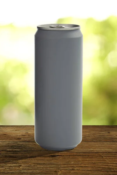 Aluminum can mockup isolated on wooden table blur background