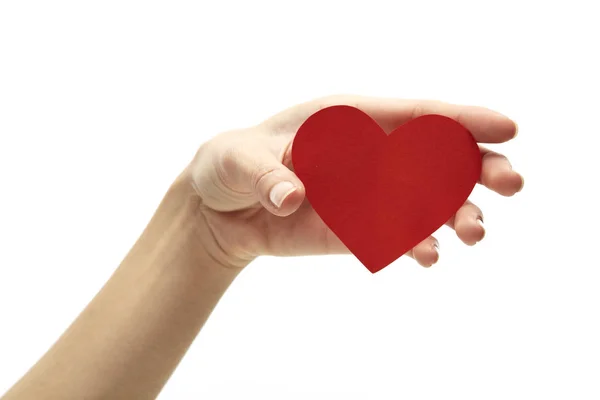 Red heart in woman hand on white — Stock Photo, Image
