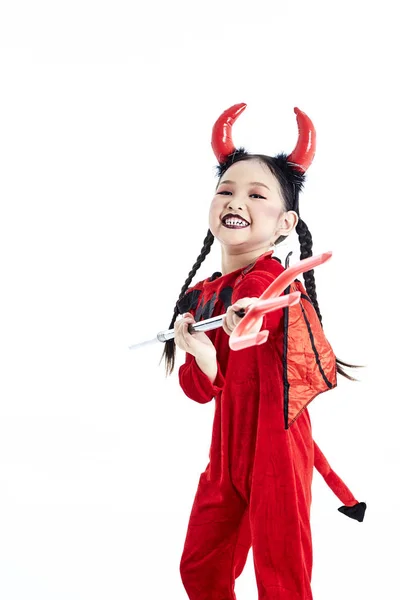 Meisje in een Halloween fancy dress duivel — Stockfoto