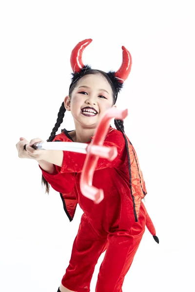 Meisje in een Halloween fancy dress duivel — Stockfoto