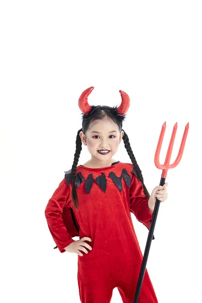 Meisje in een Halloween fancy dress duivel — Stockfoto