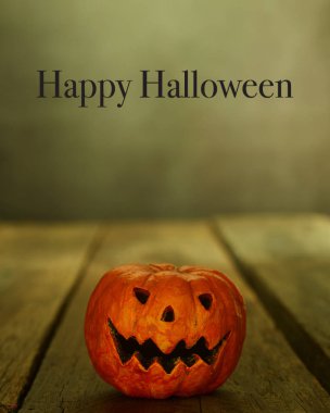 Cadılar Bayramı için Jack O 'Lantern tahtada