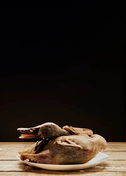 Asian food. Raw duck carcass prepared for roasting, Whole raw duck ready to cook