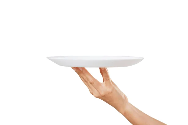 Κενό Λευκό Πιάτο Ένα Γυναικείο Χέρι Λευκό Φόντο Χαράσσοντας Μονοπάτι — Φωτογραφία Αρχείου